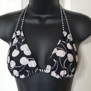 Cute strappy bikini top with cherry design.